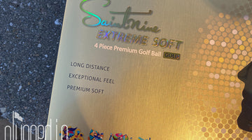 Plugged In golf image of a dozen Saintnine ES Gold golf balls. 